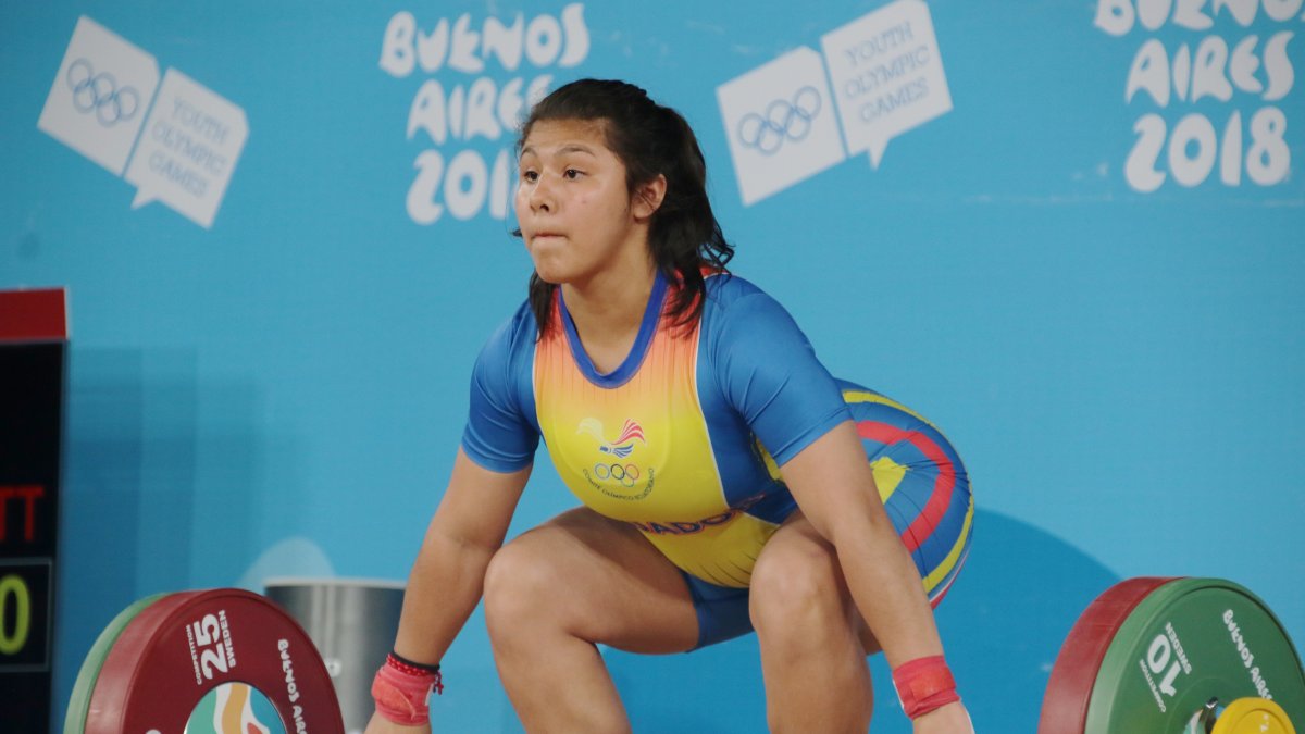 La pesista Bella Paredes será la portaestandarte femenina de la delegación por sus logros, entre ellos el cuarto lugar en los Juegos Olímpicos de la Juventud y el vicecampeonato mundial juvenil 2021.
