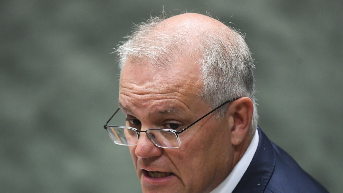 El primer ministro australiano, Scott Morrison, pidió ayer perdón a las víctimas y ofreció transparentar lo sucedido hace tres años. LUKAS COCH / EFE