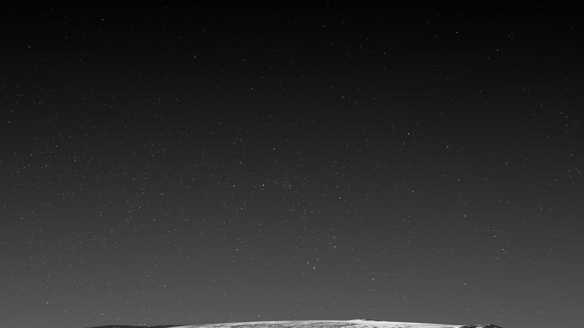 Vista en perspectiva de la región volcánica helada de Plutón.