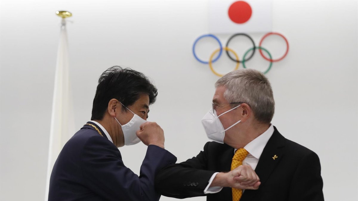 Thomas Bach y Shinzo Abe.