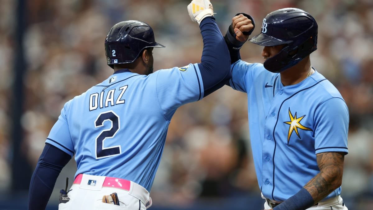 El cubano Yandy Díaz (i) comandó la victoria de los Tampa Bays.