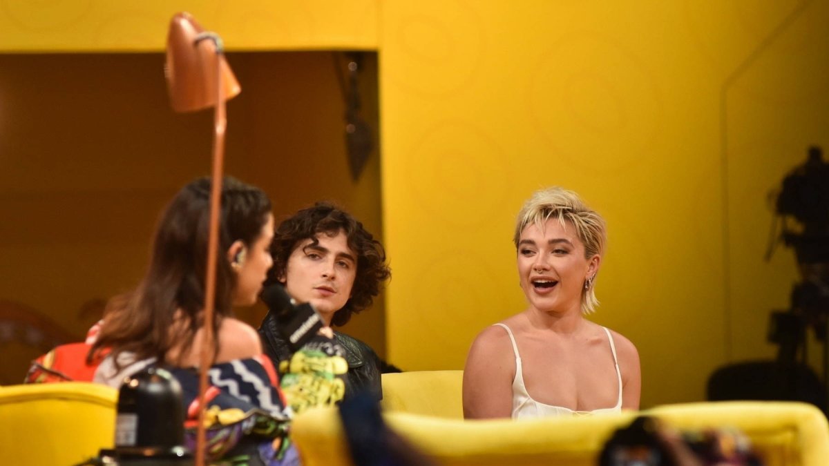 Florence Pugh junto a Timothée Chalamet en el evento celebrado en Brasil.