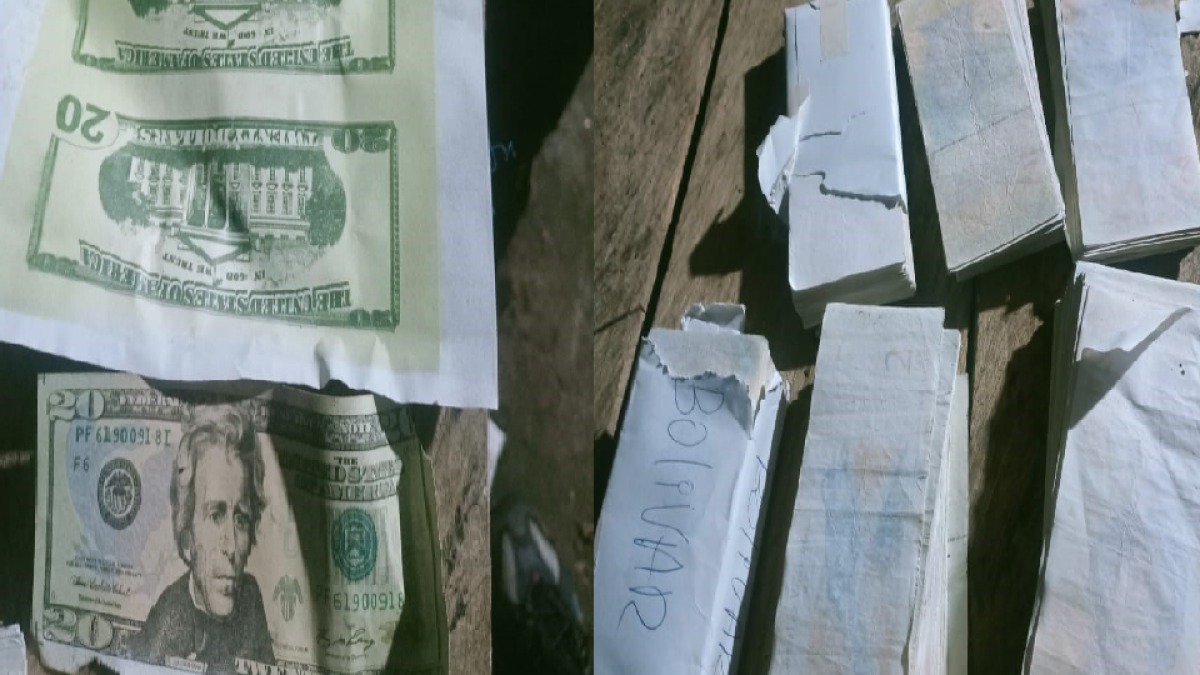 Las hojas impresas con la imagen del billete de 20 dólares y paquetes con billetes falsos fueron decomisadas en el operativo.