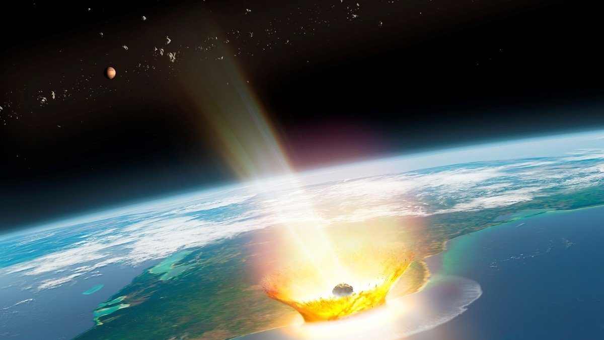 Impresión artística del impacto de un gran asteroide en la Tierra, como el de Chicxulub, que provocó la extinción masiva del Cretácico, hace 66 millones de años.