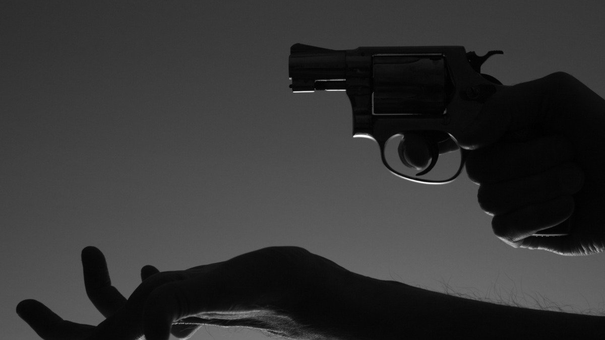 Referencial. Imagen sobre asalto con un arma