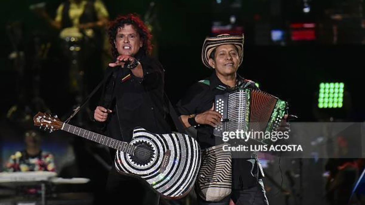 Egidio Cuadrado (der.) junto a Carlos Vives.