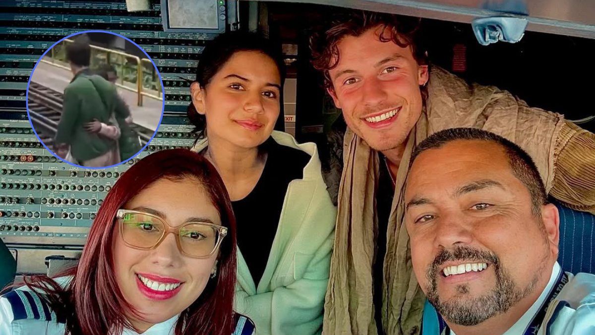 Helena Gualinga y Shawn Mendes, sonriendo junto a tripulantes de un avión en uno de los viajes que realizaron juntos en enero de 2025.