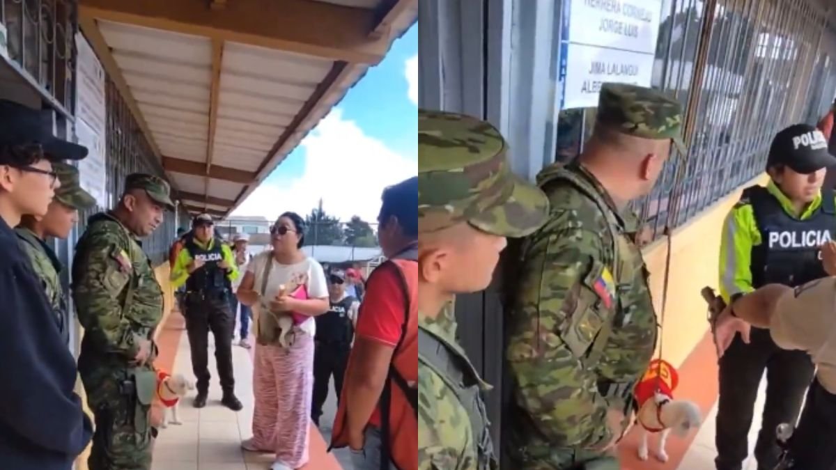 Captura de video que circula en redes sociales en donde se muestra a personal de la fuerza pública  hablando con la ciudadana que denuncia que no la dejan votar acompañada de su mascota.