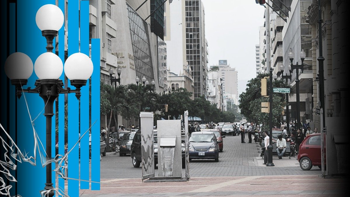 El Bulevar 9 de Octubre se desdibuja en las tinieblas, durante la noche.