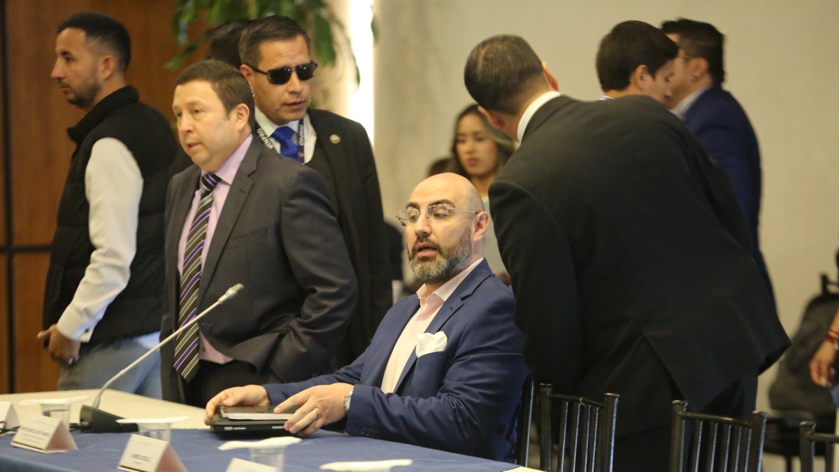 Mario Godoy, presidente del Consejo de la Judicatura, y su abogado, Stalin Raza.