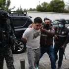 Diligencia. Ayer por la noche se esperaba la formulación de cargos para tres sospechosos del asesinato.