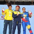 La medallista olímpica Neisi Dajomes va bien en el cambio de 76 a 87 kg: oro y récord regional.