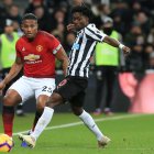 Manchester United"s Ecuadorian midfielder Antonio Valencia (L) vies with Newcastle United"s Ghanaian midfielder Christian Atsu during the English Premier League football match between Newcastle United and Manchester United at St James" Park in Newcastle-upon-Tyne, north east England on January 2, 2019. (Photo by Lindsey PARNABY / AFP) / RESTRICTED TO EDITORIAL USE. No use with unauthorized audio, video, data, fixture lists, club/league logos or "live" services. Online in-match use limited to 120 images. An additional 40 images may be used in extra time. No video emulation. Social media in-match use limited to 120 images. An additional 40 images may be used in extra time. No use in betting publications, games or single club/league/player publications. / FBL-ENG-PR-NEWCASTLE-MAN UTD