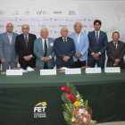 El cuñado de Lasso, Danilo Carrera, y Rubén Chérres en un evento dirigencial deportivo.