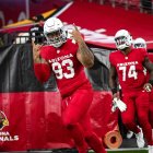 Los jugadores de Cardenales tras la victoria satisfactoria de debut.