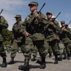 Los beneficiarios obtendrán formación en combate, seguro de salud y vida, así como oportunidades de capacitación.