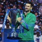 Turin (Italy), 19/11/2023.- Novak Djokovic of Serbia poses with the trophy after winning his singles finals match against Jannik Sinner of Italy at the Nitto ATP Finals tennis tournament in Turin, Italy, 19 November 2023. (Tenis, Italia) EFE/EPA/ALESSANDRO DI MARCO