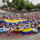 Cita. En la ciudad de Guayaquil se congregan migrantes venezolanos para exigir la publicación de las actas de excrutinio de las últimas elecciones.