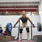 La pesista ecuatoriana Neisi Dajomes no ha dejado las prácticas en la capital.