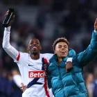 Ousmane Dembele y Désiré Doué festejan tras un partido del PSG.