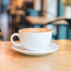 hot caramel macchiato in coffee shop