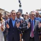 LUJÁN. El presidente saliente, Mauricio Macri (Izq.), junto al presidente electo, Alberto Fernández (Der.), durante una misa este domingo.