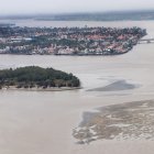 El islote El Palmar se forma en la confluencia de los ríos Daule y Babahoyo frente al sector de La Puntilla.