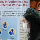 A woman wearing a face mask passes a Public Health England sign, warning passengers arriving on flights into the UK, that a virus, Coronavirus, has been detected in Wuhan in China, at Terminal 4 of London Heathrow Airport in west London on January 28, 2020. - Chinese President Xi Jinping said Tuesday the country was waging a serious fight against the "demon" coronavirus outbreak and pledged transparency in the government"s efforts to contain the disease. (Photo by DANIEL LEAL-OLIVAS / AFP)