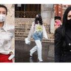 Invitadas a los desfiles complementan sus looks con mascarillas para protegerse del virus.