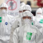 Daegu (Korea, Republic Of), 13/04/2020.- Medical workers in protective gear walk to wards, for COVID-19 patients, before their work shift at Dongsan Hospital in Daegu, South Korea, 13 April 2020. (Corea del Sur) EFE/EPA/YONHAP SOUTH KOREA OUT