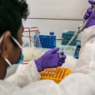Institut Pasteur laboratory workers perform PCR (Polymerase Chain Reaction) tests to determine whether patients are positive for the new COVID-19 coronavirus, in Antananarivo, April 23, 2020. - Since March 18, 2020, Institut Pasteur has tested 2300 patients for the COVID-19 coronavirus. Each test requires 4 hours of processing time. To date, 121 patients have been tested positive for COVID-19, including 58 patients who have been cured. (Photo by RIJASOLO / AFP)