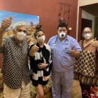 Romina con sus progenitores