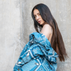 Es una de las raperas con más años de trayectoria. Ha colaborado con Nelly Furtado y Julieta Venegas.