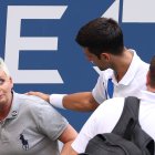 NEW YORK, NEW YORK - SEPTEMBER 06: Novak Djokovic of Serbia tends to a line judge who was hit with the ball during his Men"s Singles fourth round match against Pablo Carreno Busta of Spain on Day Seven of the 2020 US Open at the USTA Billie Jean King National Tennis Center on September 6, 2020 in the Queens borough of New York City.   Al Bello/Getty Images/AFP

== FOR NEWSPAPERS, INTERNET, TELCOS & TELEVISION USE ONLY ==

 GSE-SPO-TEN-WTA-2020-US-OPEN---DAY-7