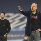 Los entrenadores, Mikel Arteta (i) y Pep Guardiola (d), trabajaron juntos en el Manchester City.