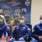 Baikonur (Kazakhstan), 13/10/2020.- A handout photo made available by the Russian State Space Corporation ROSCOSMOS shows members of the expedition 64 to the International Space Station (ISS), NASA astronaut Kate Rubins (L), Roscosmos cosmonauts Sergey Ryzhikov (C) and Sergey Kud-Sverchkov (R) during a news conference at the Baikonur Cosmodrome, Kazakhstan, 13 October 2020. The Soyuz-2.1a carrier rocket with the Soyuz MS-17 crewed spacecraft is scheduled to be launch on 14 October 2020 from the Baikonur cosmodrome for a 177 days mission on the International Space Station. (Kazajstán, Rusia, Roma) EFE/EPA/Space Center Yuzhny/ROSCOSMOS HANDOUT HANDOUT EDITORIAL USE ONLY/NO SALES