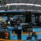 Talleres. En el centro de mantenimiento de El Recreo, el personal se entrena para reparar y operar las unidades que llegarán a partir del 2022.