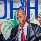 Fotografía de un mural del asesinado presidente Jovenel Moise hoy, en Puerto Príncipe (Haití).