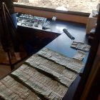 Objetos y dinero decomisados por la Policía Nacional