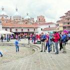 Turistas llegaron desde el viernes pasado a Cuenca. Otros separaron hotel para hoy.