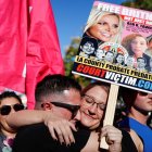Aaron Morris (L) and Elizabeth Crocker (R) embrace upon hearing the news that Britney Spears"Äô conservatorship has been terminated, at the Stanley Mosk Courthouse in Los Angeles, California, USA, 12 November 2021.
