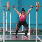 Esfuerzo. Bella  Paredes, pesista ecuatoriana, cumple exigentes entrenamientos para llegar lejos en la disciplina.