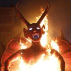 Fotografía de un diablo de papel y metal de cinco metros y 400 libras quemándose como un signo de protesta por el mal manejo de la pandemia de parte del presidente Alejandro Giammattei, hoy en Ciudad de Guatemala (Guatemala).