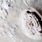 Regional and Mesoscale Meteorology Branch (RAMMB) of National Oceanic and Atmospheric Administration (NOAA)/NESDIS shows an explosive eruption of the Hunga Tonga-Hunga Ha"apai volcano, located in the South Pacific Kingdom of Tonga, 15 January 2022. The eruption on 15 January, the second in only two days, was the latest in a series of eruptions from the undersea volcano. According to a Public Notice from the Tonga Geological Services monitoring the Hunga-Tonga-Hunga-Ha"apai (HTHH) issued on 15 January 2022, satellite images captured on the day indicated that the volcanic eruption continued, with ash plume emission. EFE/EPA/RAMMB/NOAA/NESDIS HANDOUT -- BEST QUALITY AVAILABLE -- HANDOUT EDITORIAL USE ONLY/NO SALES