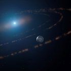 Impresión artística de la estrella enana blanca WD1054-226, orbitada por nubes de restos planetarios y un gran planeta en su zona habitable.