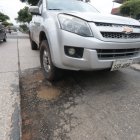 Varios problemas en la Av. Benjamin Carrión, entre ellos los baches Agencia (ag-extra)
