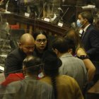 Los legisladores realizaban los últimos cabildeos previo a la fallida primera votación que no alcanzó los votos necesarios.