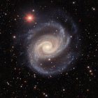 Hace miles de  millones de años, la galaxia enana fue atraídas hacia la nebulosa. EFE