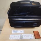 La maleta contenía dos láminas con 1.430 gramos de cocaína.