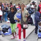 Fotografía de archivo en la que se registró a un grupo de migrantes venezolanos, en la frontera entre Colombia y Ecuador.
